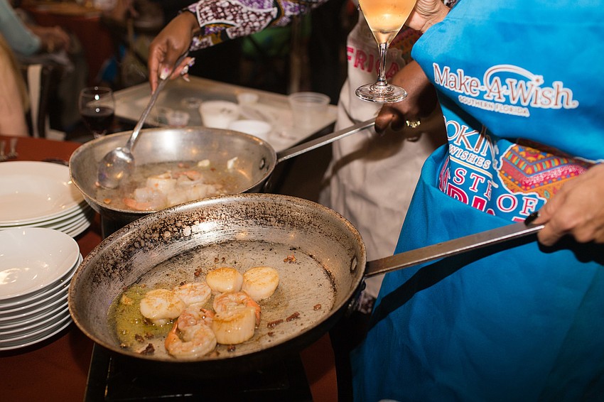 The first course featured scallops and shrimp.