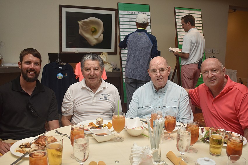 The Rev. Eric Scanlan, Lenny DiStefano, Mosignor Gerry Finegan and Chuck Sobieck
