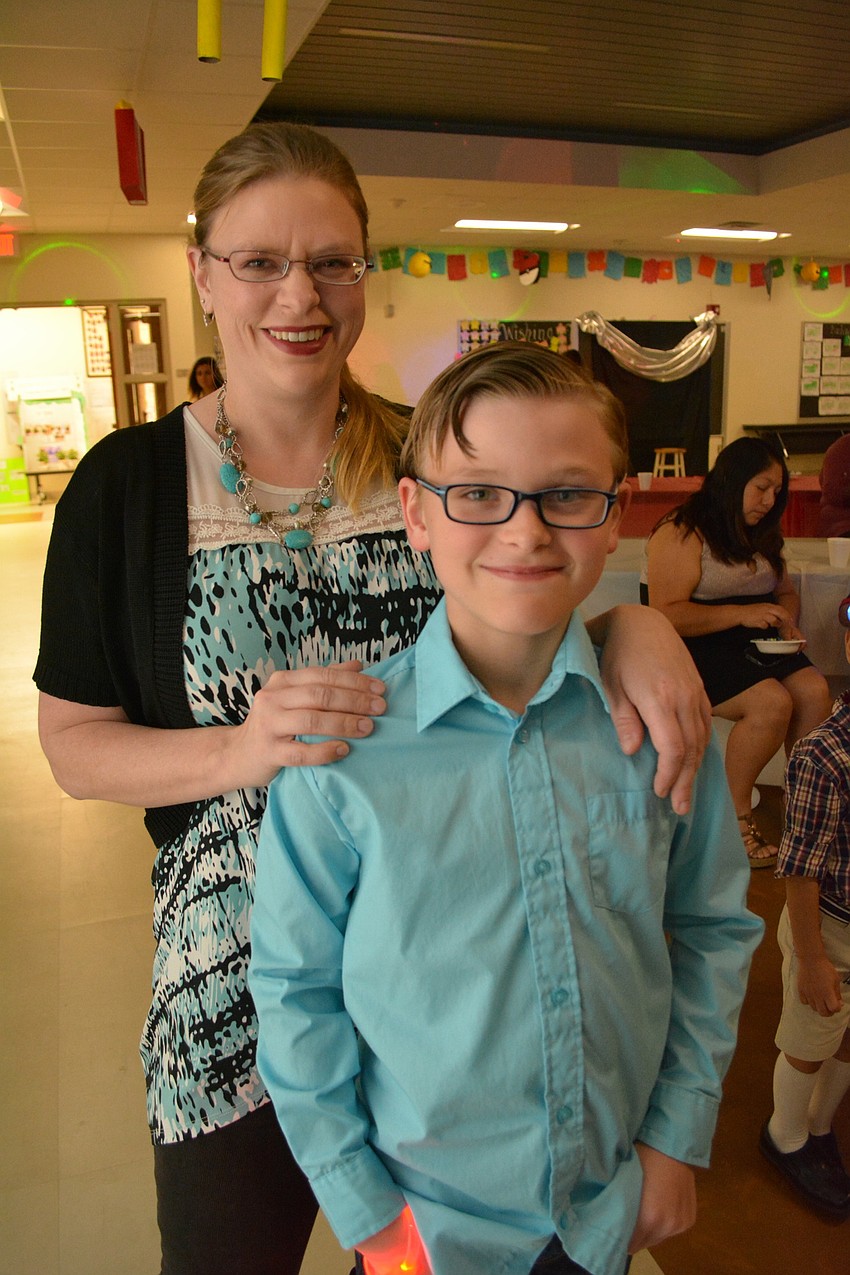 Christine and Trevor Austin missed their Cub Scouts meeting to attend.