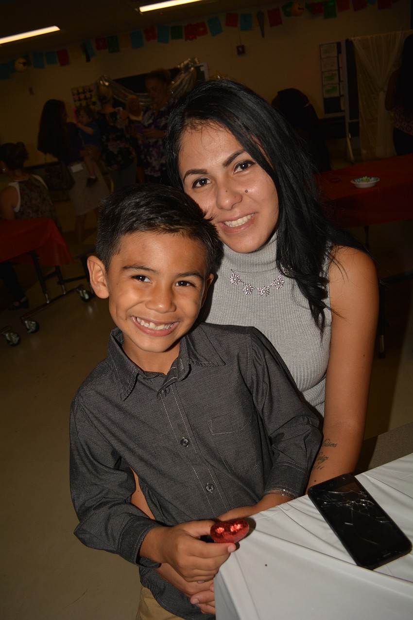 Moises and Maria Ruiz attend their first mother-son dance.