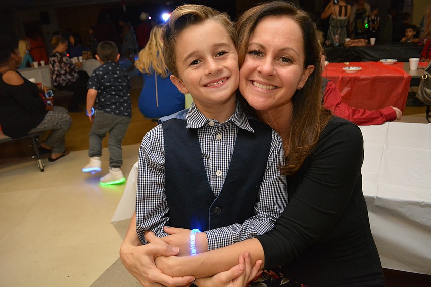 Ashton Barbee, with his mom, Tiffany, says he loves 