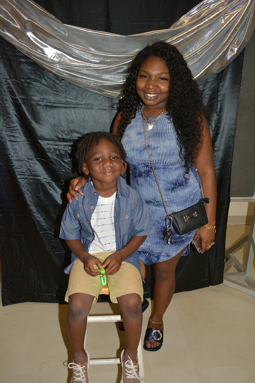 Alandra Clarke poses for a quick portrait with her son Ishmael Dunbar, 6.