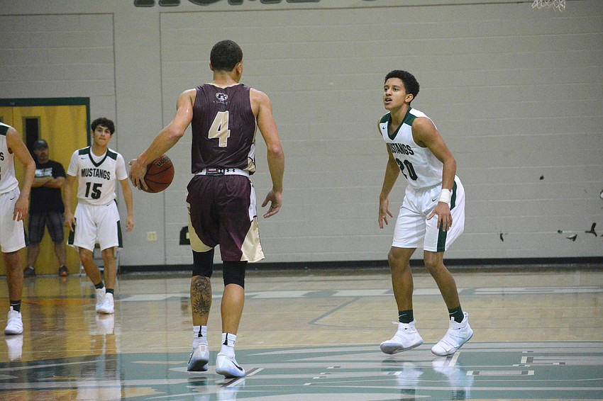Sophomore Keon Buckley guards a Riverdale player up the court.