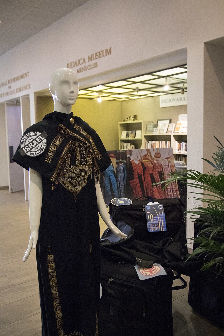 A traditional dress from Israel is displayed at the fashion show.
