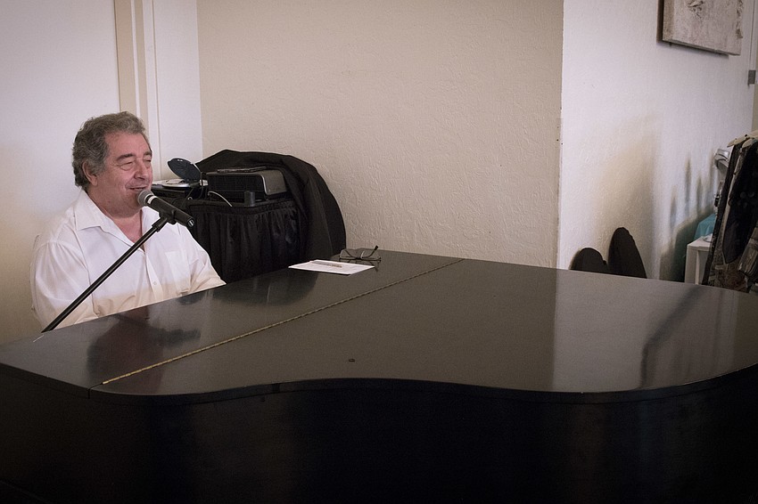 Joe Micals serenades the crowd during the luncheon.