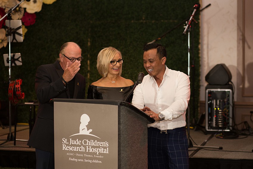 Les McCurdy, Lulu from 92.1 CTQ and Pacific Rim Chef Seth Senenoi talk about Senenoi's appetizer.