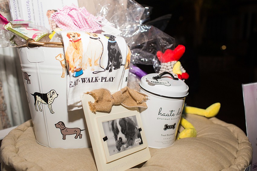 Silent auction items centered around the pet theme.
