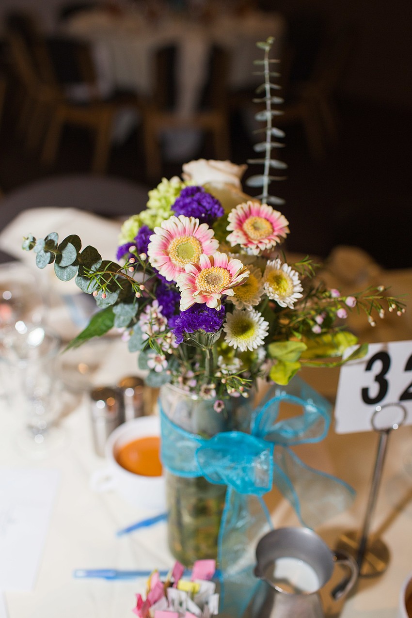 An arrangement of wildflowers decorated the tables.