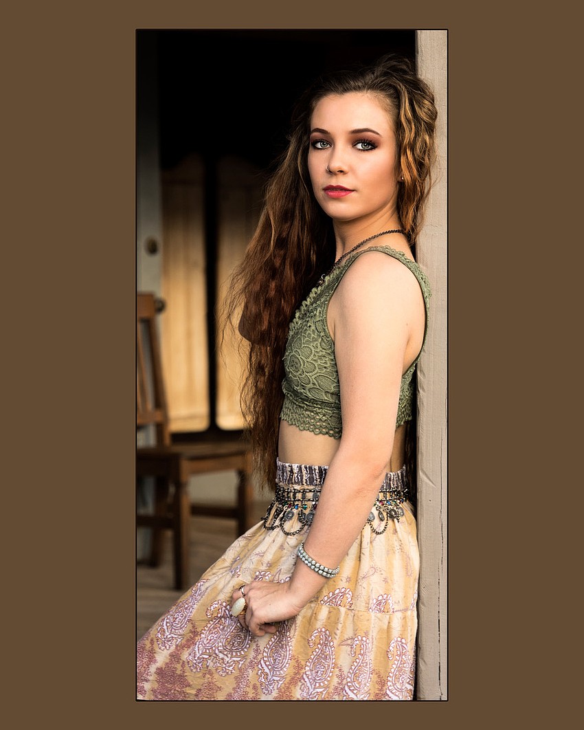 DeYoung photographed this girl at an outdoor studio. 