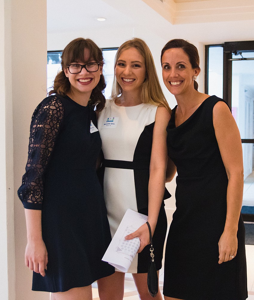 Event volunteers Claire Ellis, Meredith Ellis and Britton Stevens