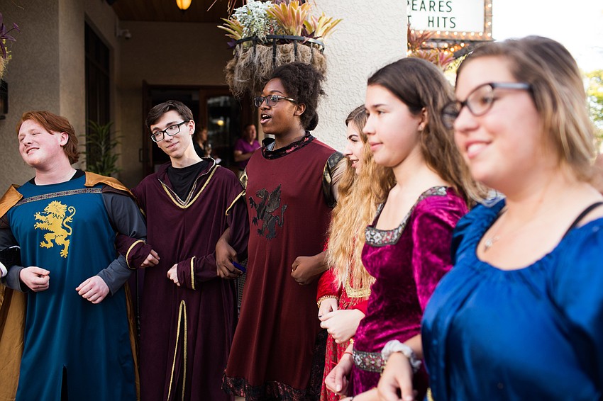 The Venice High School Madrigal Choir sing throughout cocktail hour on the FST sidewalk.