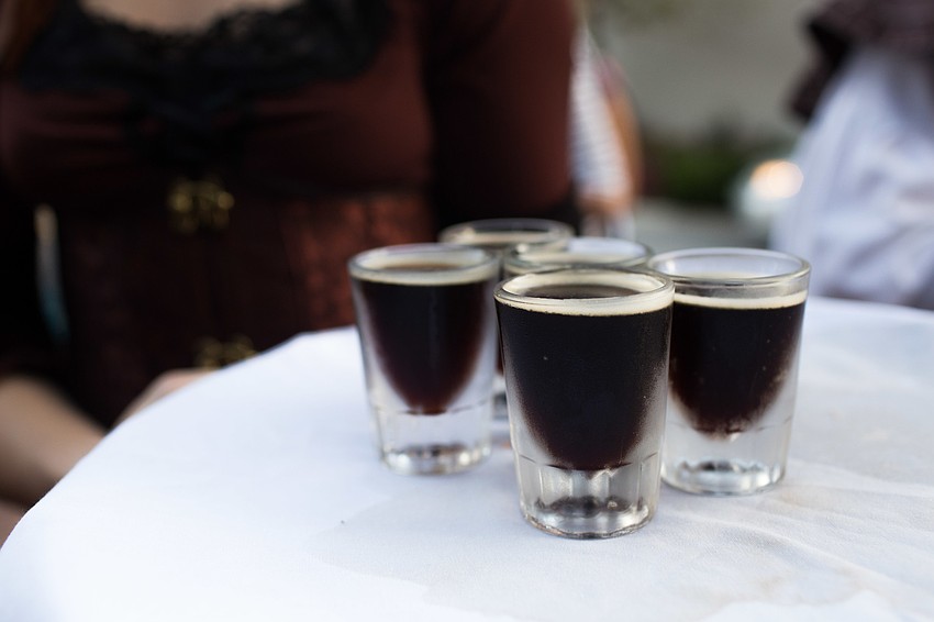 Chocolate stout in mini frosty glasses was brought around to guests.