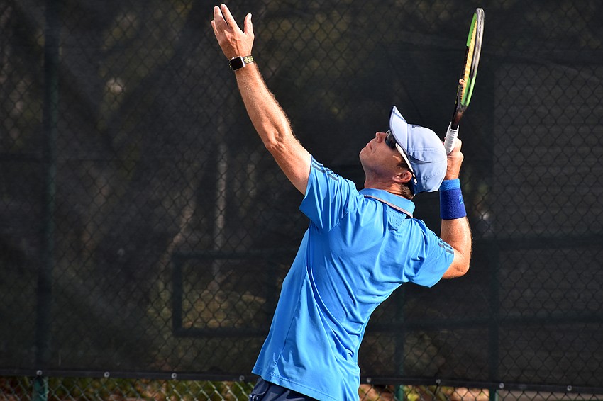 Claudiu Retean, tennis pro at The Longboat Key Tennis Center serves during the tennis pro game.