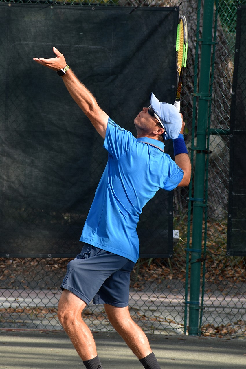 Claudiu Retean, tennis pro at The Longboat Key Tennis Center serves during the tennis pro game.