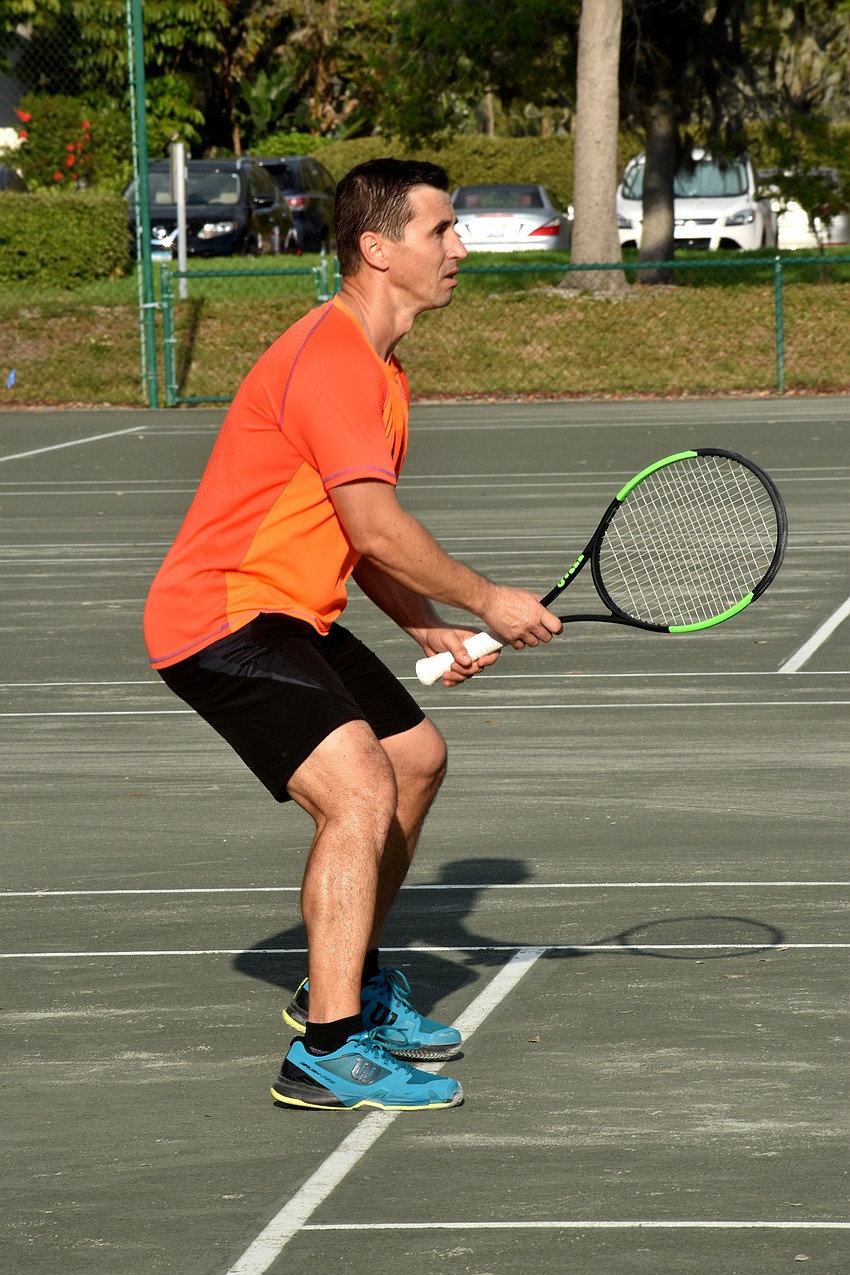 Sergiu gets ready to defend his side of the court.