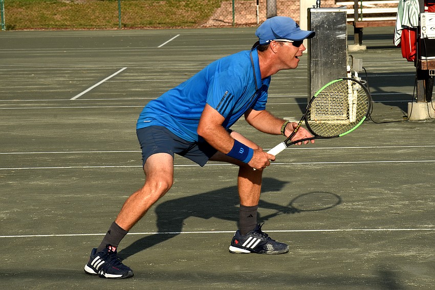 Claudiu Retean gets ready during the tennis pro game.