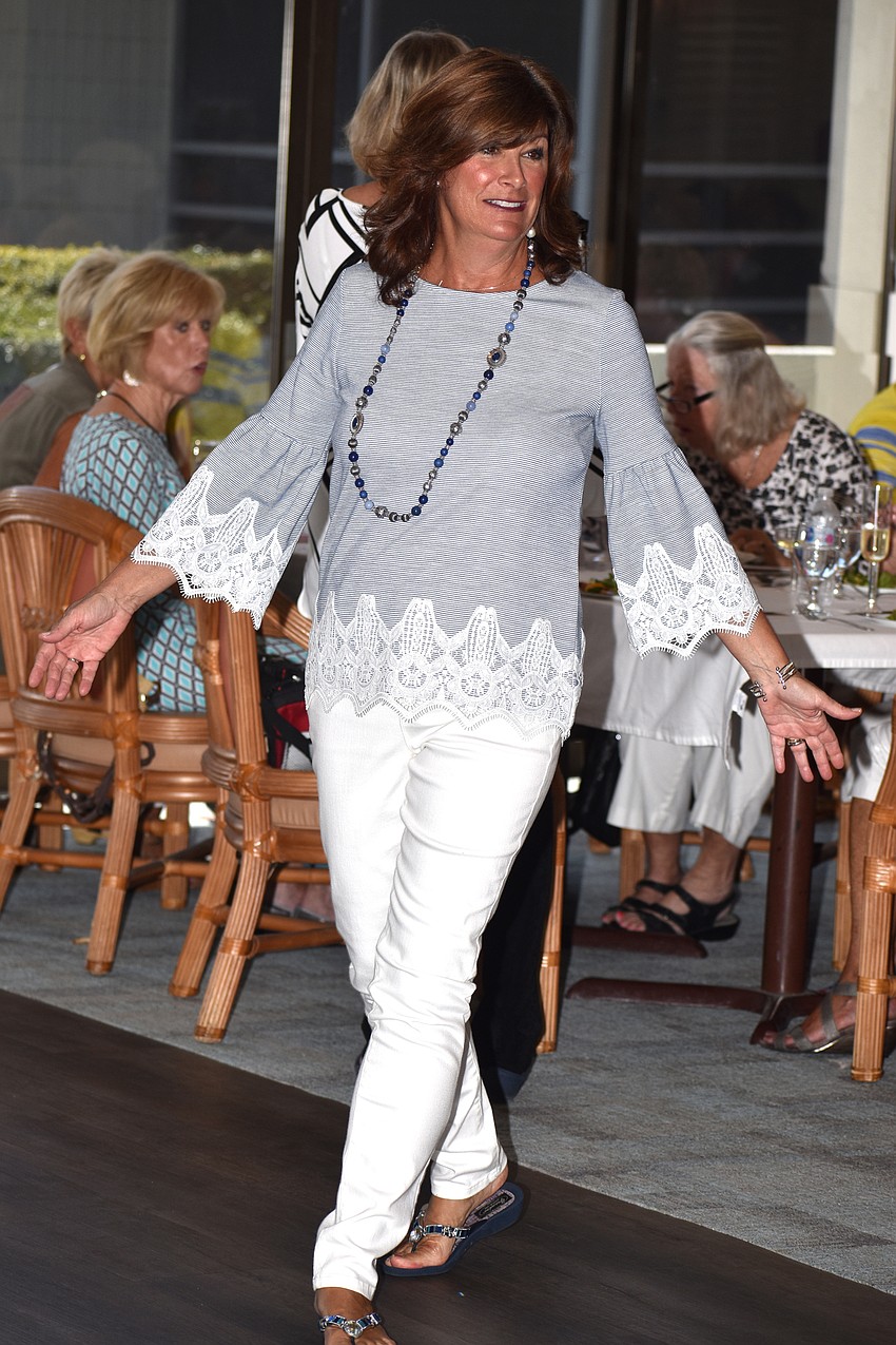 Mary Jean Drugan begins to twirl for the crowd.