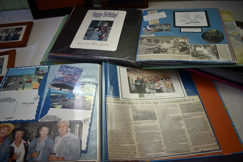 Scrapbooks showing the history of Twin Shores were on display.