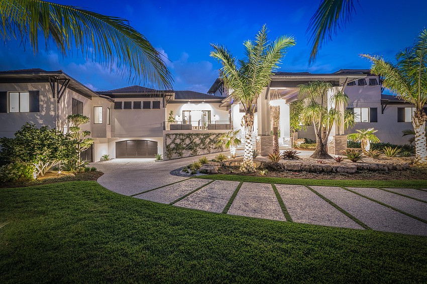 Along with four bedrooms and six bathrooms, the property includes a garage that can hold 10 cars and be expanded to fit more.