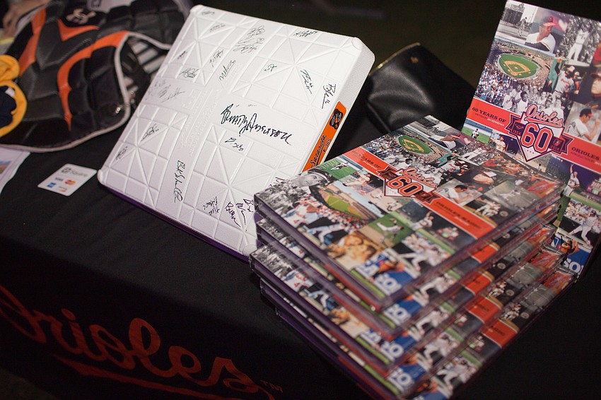 Silent auction items included signed Orioles memorabilia.