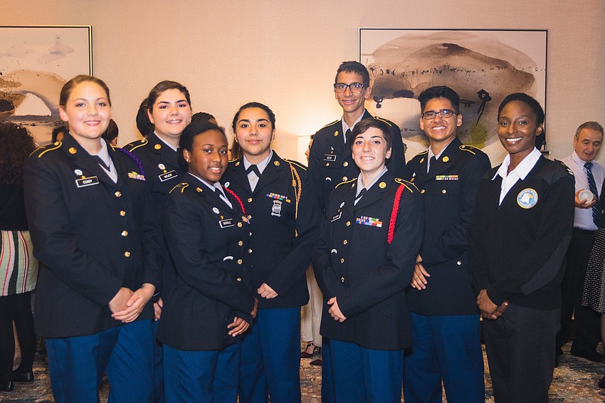 Sarasota Military Academy students Haley Coolady, Valerie Wojckil, Guadalupe Perez, Kalah Norvile, Mark Neese, Sarah Bleckmer, David Casas and teacher Hope White