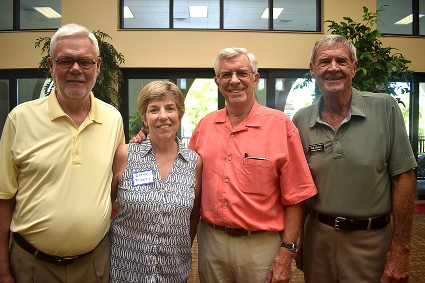 Speaker the Rev. Andrew Purves, Cathy Purves, the Rev. Norman Pritchard and Bill Johnson