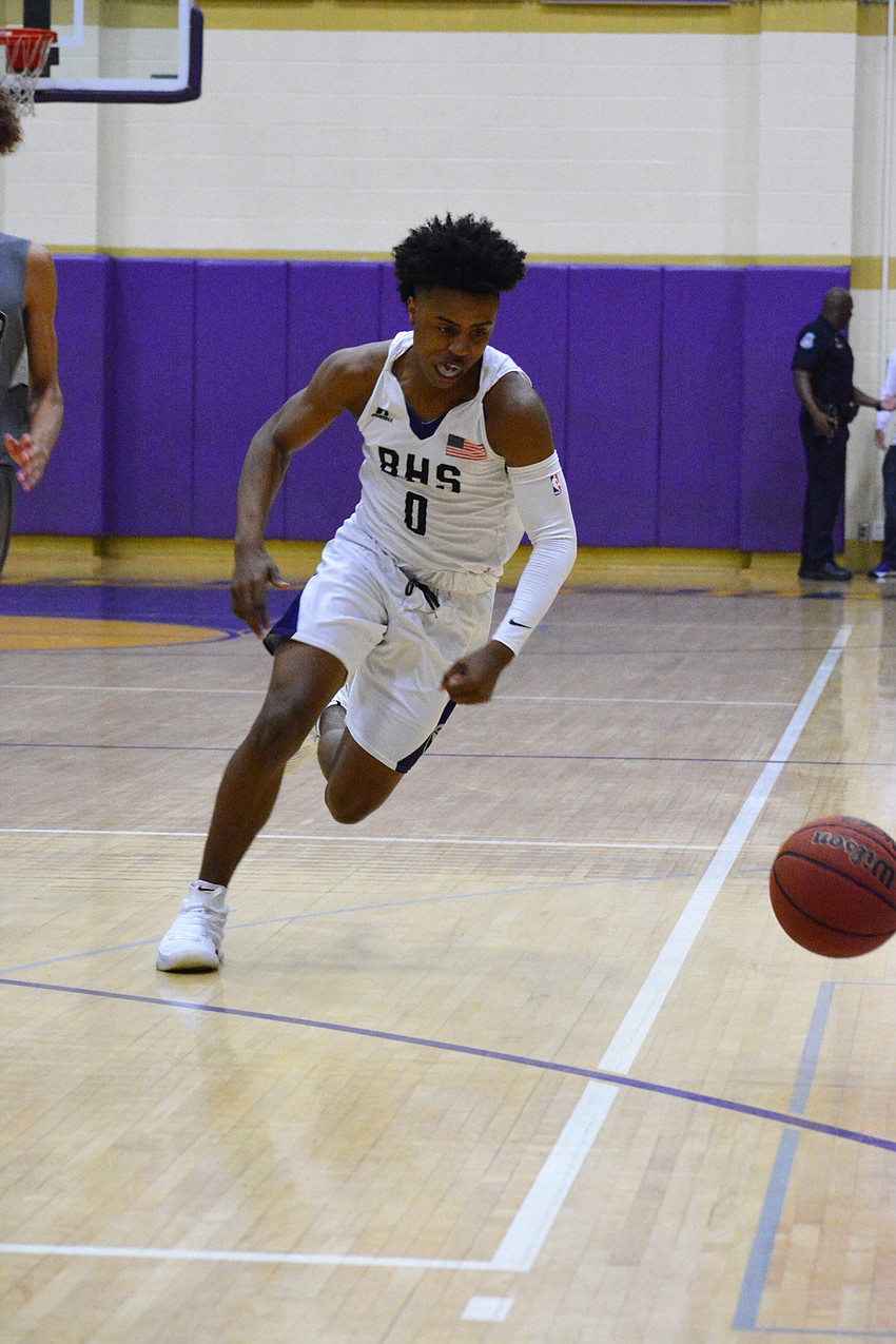 Senior guard Jaylen Jones chases down a loose ball.