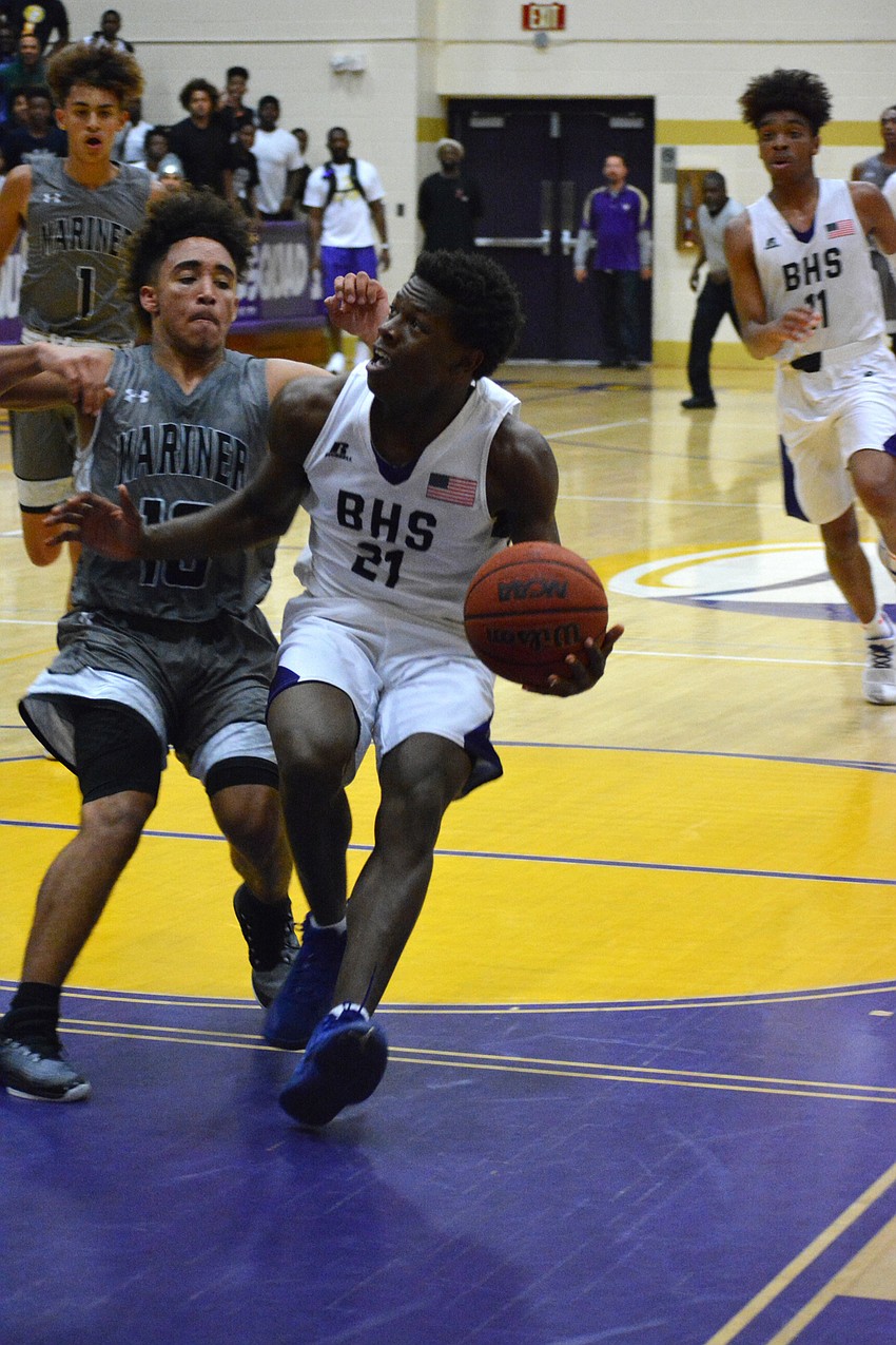 Junior wing Eldrien Arnold gets in the paint.