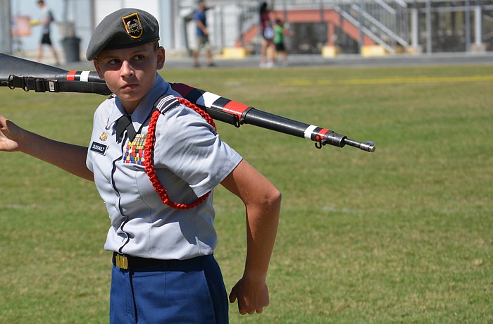 Sarah Dussault helps her team win the Female Platoon Exhibition class.