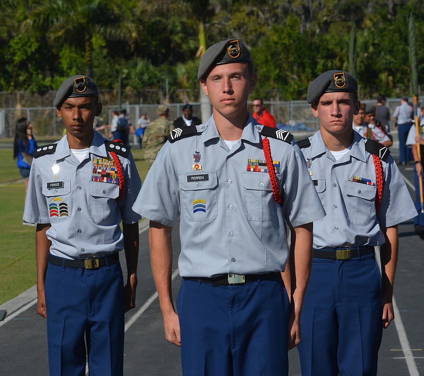 Commander Michael Perren leads the Unarmed Squad into its drill.