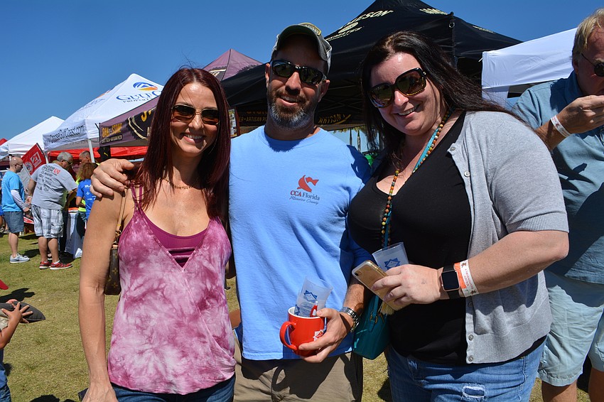 Lakewood Ranch's Julie O'Brien, her boyfriend Mike Bente and friend Keisha Young support the Sertoma Club of Greater Sarasota, of which Bente is a member.