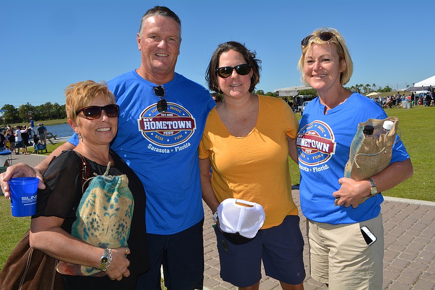 Denise Kircher, with Mike Ray, Julie Wheeler and Christa Sweeney, make sure to get Blood Bros.' bloody Mary mix. Kircher says 