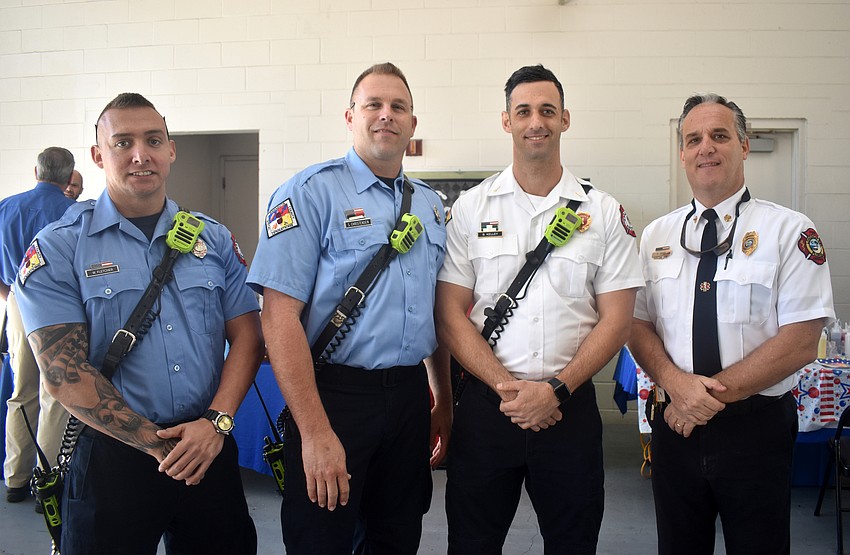 William Fletcher, Scott Christensen, Brandon Kelley and Longboat Key Fire Rescue Chief Paul Dezzi