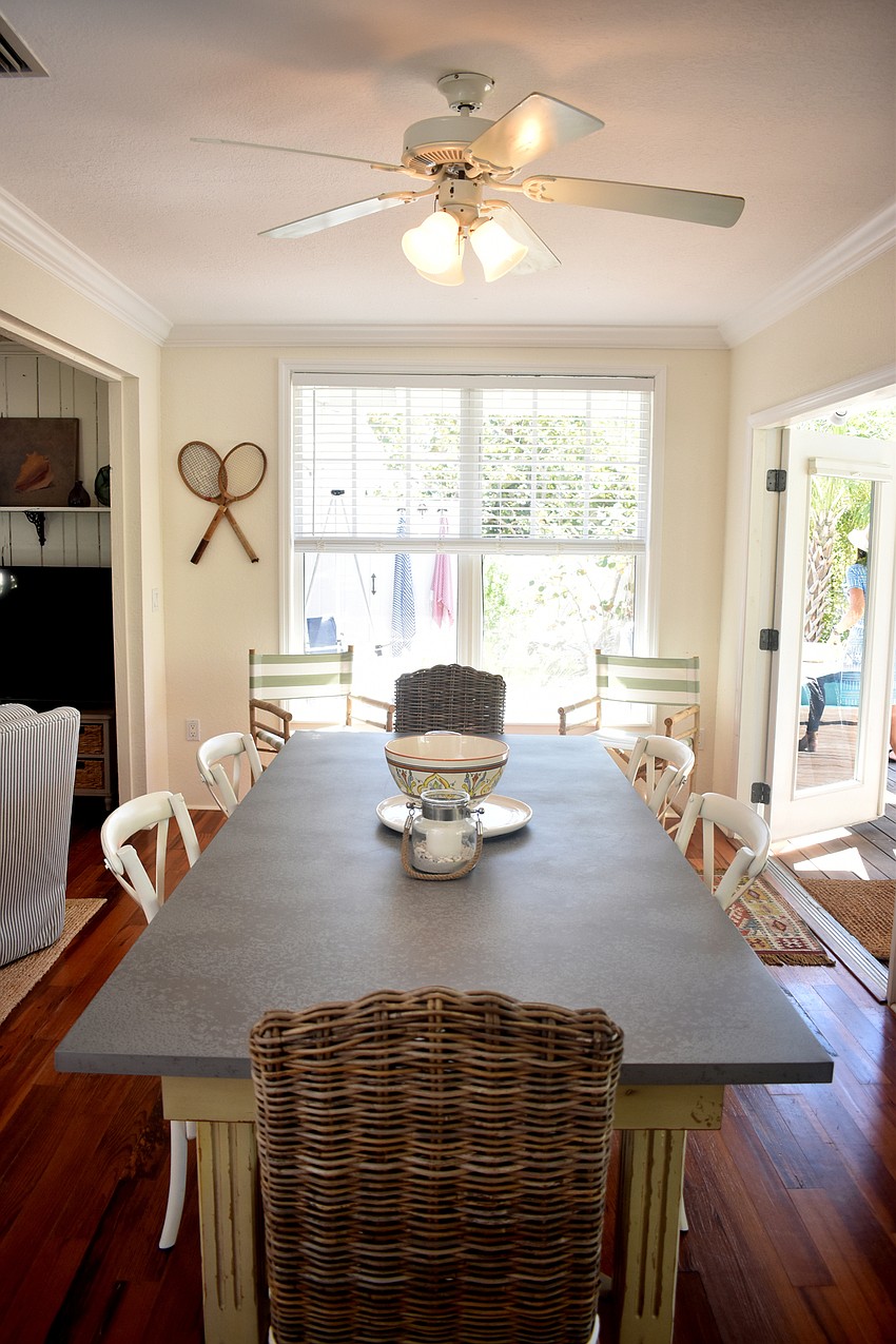 A dining room table completes the homey feel in the Schneiderman home.