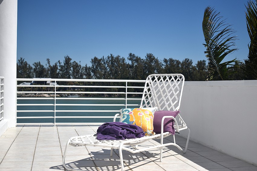 Outdoor furniture completes patios of the Gerich home overlooking Jewfish  Key.