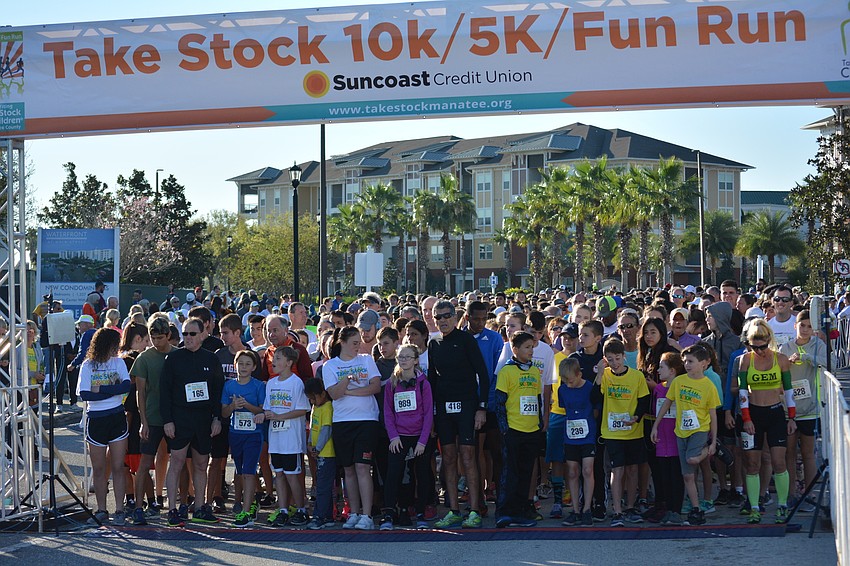 Runners prepare for the start of the 5K event.