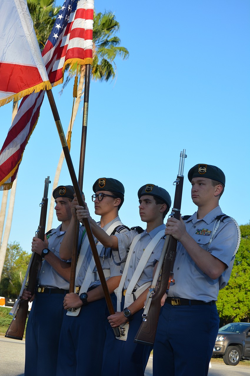 Lakewood Ranch High JROTC members Steven Spicer, Matthew Hess, Ethan McDonald and Camrin Suggs present the colors.