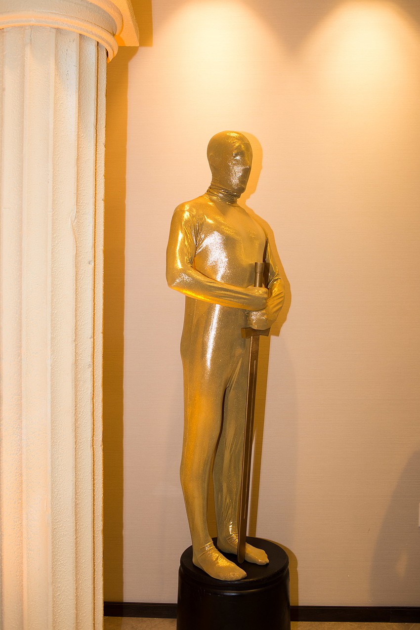 Live oscars from Live Art by Julie stood lifeless until an unsuspecting guests walked by, who got a surprising tap on the shoulder.