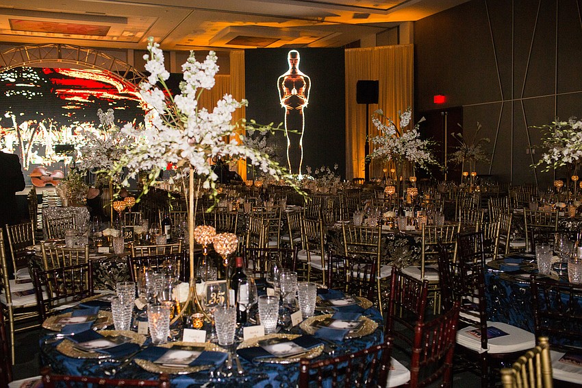 The ballroom was decorated in glitzy golds and blues.