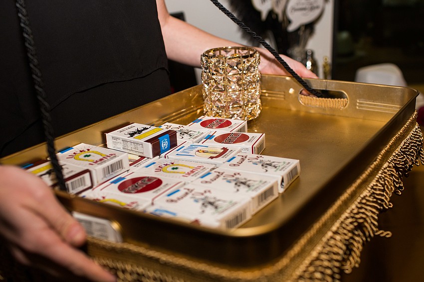 Props for the photo booth included Old Hollywood props, such as these packs of cigarettes.