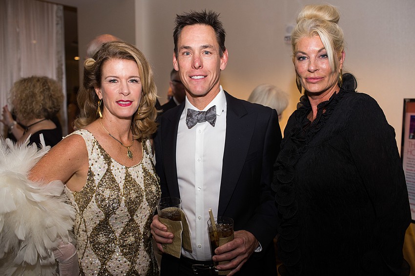 Chairwoman Elizabeth Moore, Chris Gelvin and Bitsy Raven