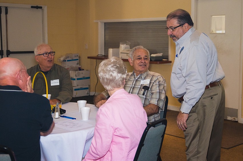 Alan Maio talks with SKA members Basil Dubrosky and Angelo Molinaro.