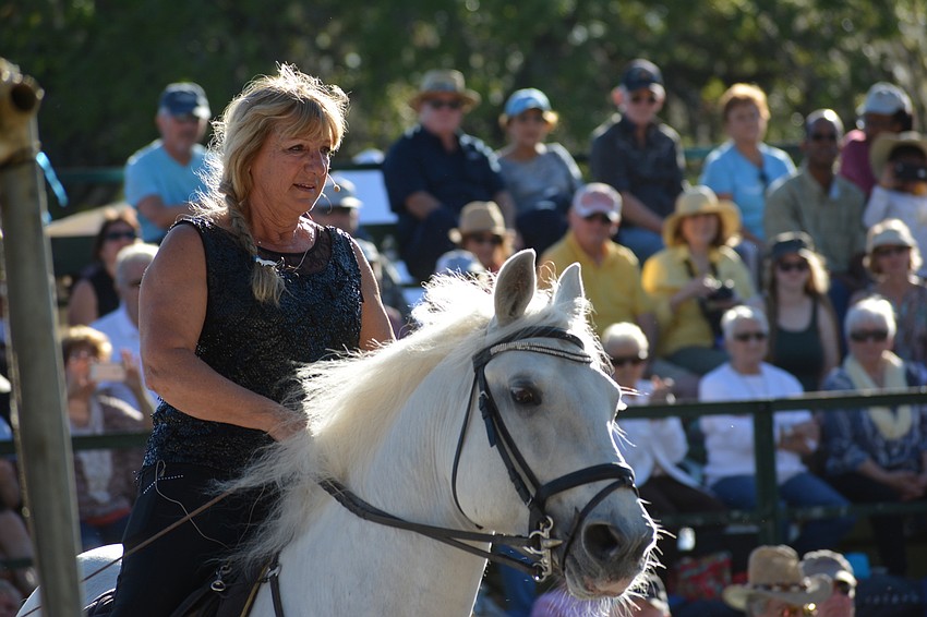 Gabby Herrmann honors her late father, Colonel Ottomar Herrmann, riding to 