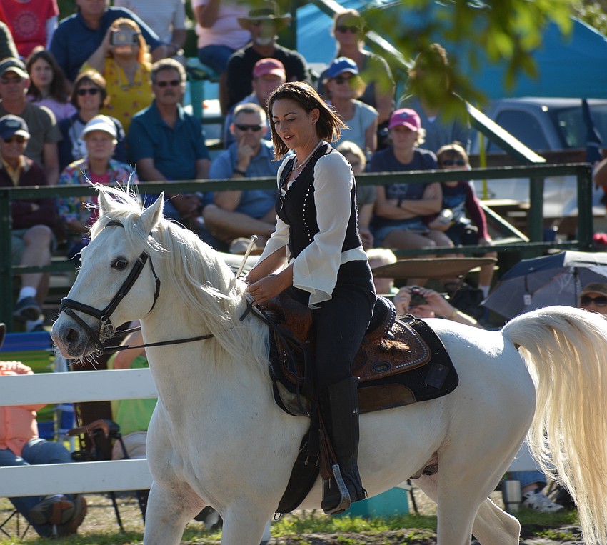 The annual benefit is the only fundraiser by the Myakka City Historical Society each year. Rachael Hughes entertains the crowd of 650.