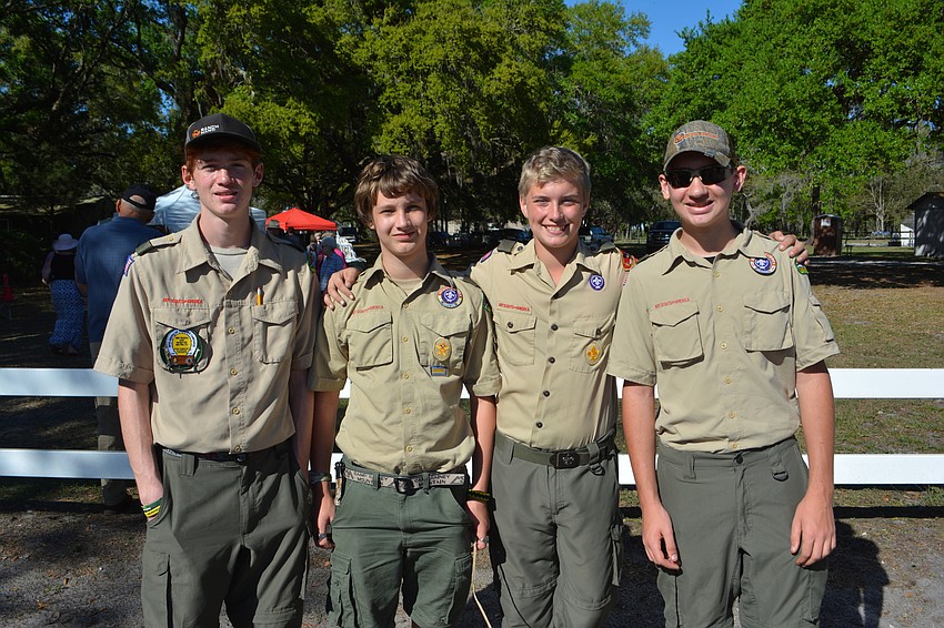 Troop 42 Boy Scouts Zach Wedin, Tommy Croumbley, Parker Lawson and Austin Wedin, all of Myakka City, volunteered to park cars at the benefit.