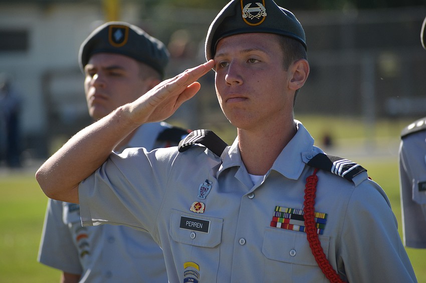 Commander Michael Perren leads his team into the Unarmed Squad drill. Nathan Stowers is in the background.
