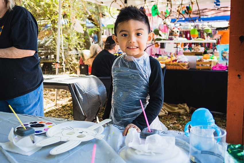 Aaron Ramirez gets ready to paint.