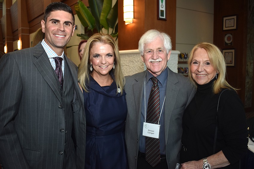 Dean Ac, Sarasota Police Chief Bernadette DiPino and Richard and Diana Corrigan, St. Armands Circle Association executive director