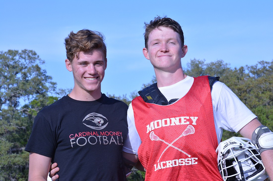 Seniors Caleb Ward and Matthew McDonnell captain the Cardinal Mooney boys lacrosse team.