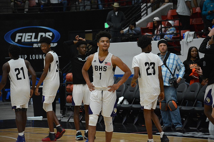 Jordan Curtis (1) takes a final look at the scoreboard before heading to the locker room. The Tornadoes fell to Leesburg by one point, 62-61.